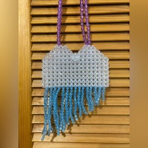 Crossbody phone pouch with tassels by Five Below
